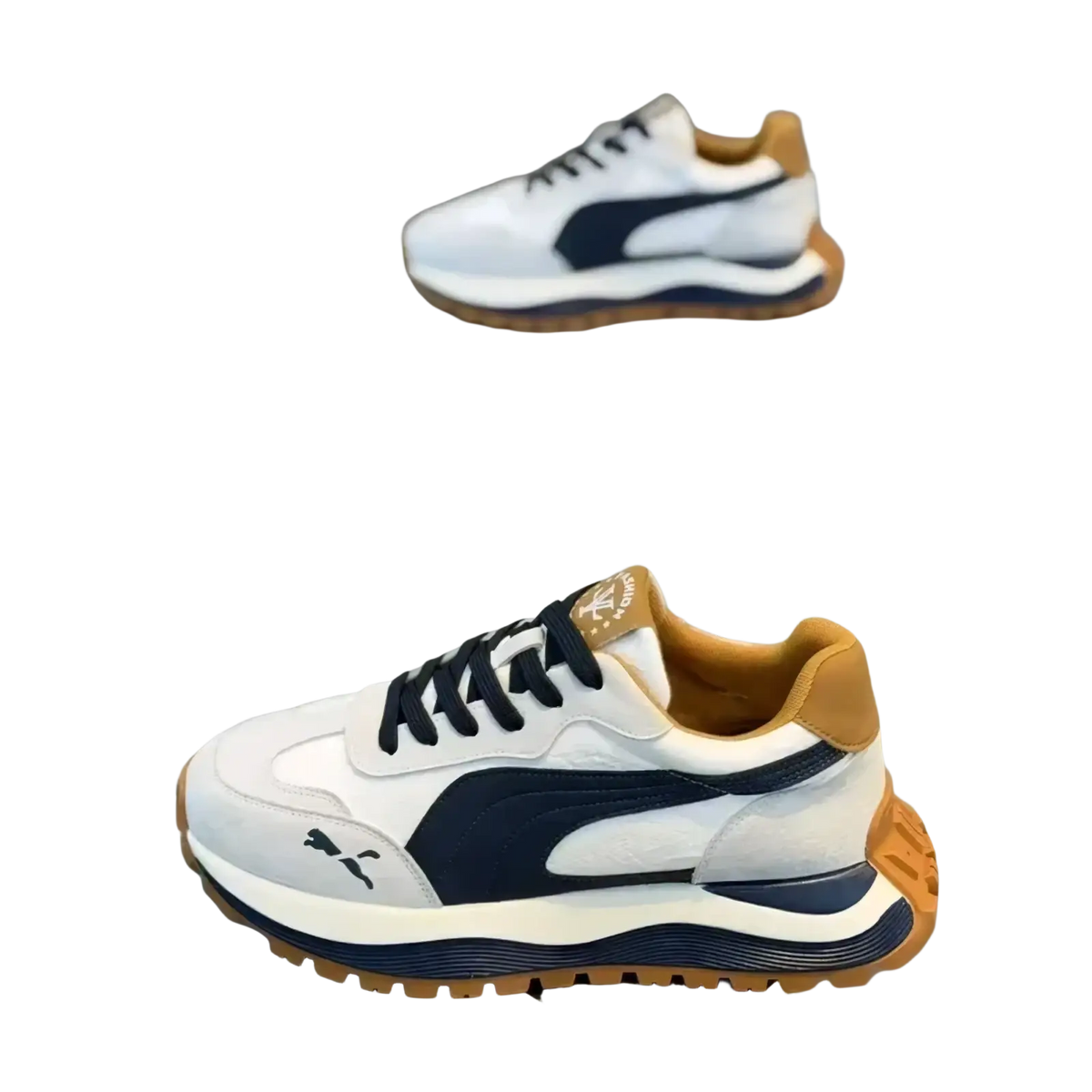 Men casual platform sneakers in white navy blue puma design with tan accents on heel and sole shown from the back