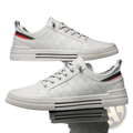 Men casual quilted leather sneakers in white with black and red striped heel tab and chunky white rubber sole