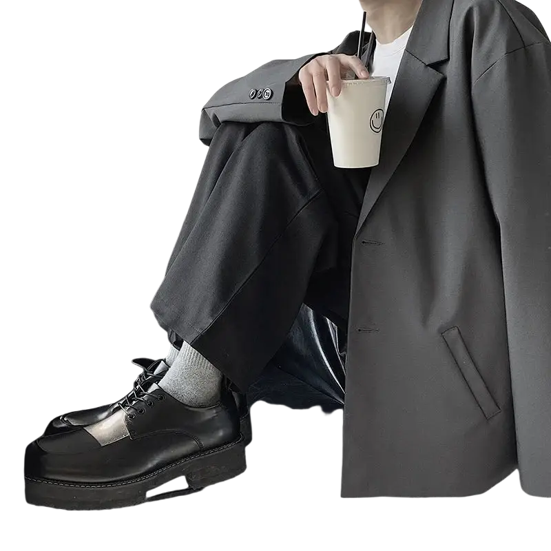 Black leather lace-up oxford shoes with silver toe cap paired with men casual solid color loose blazer jacket