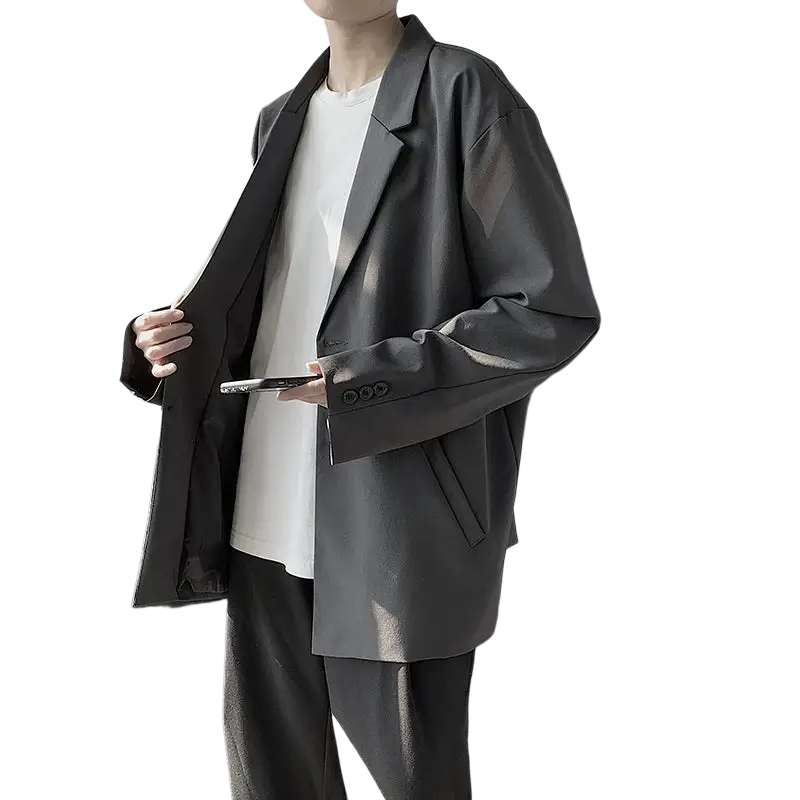 Men casual solid color loose blazer jacket in black matte finish with three-button cuffs and a relaxed fit