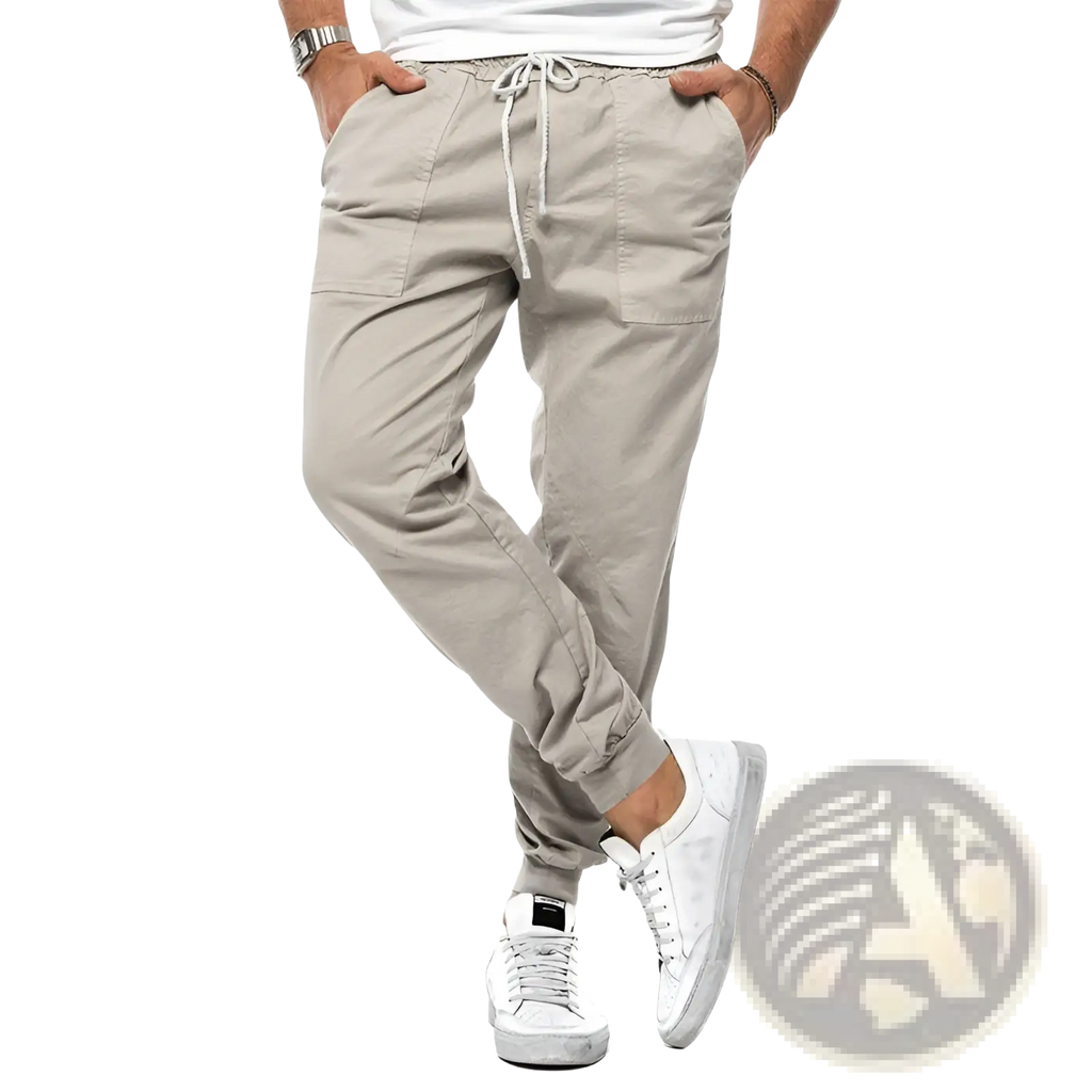 Beige men casual tapered joggers with drawstring waist, side pockets, and elastic cuffs for comfortable wear