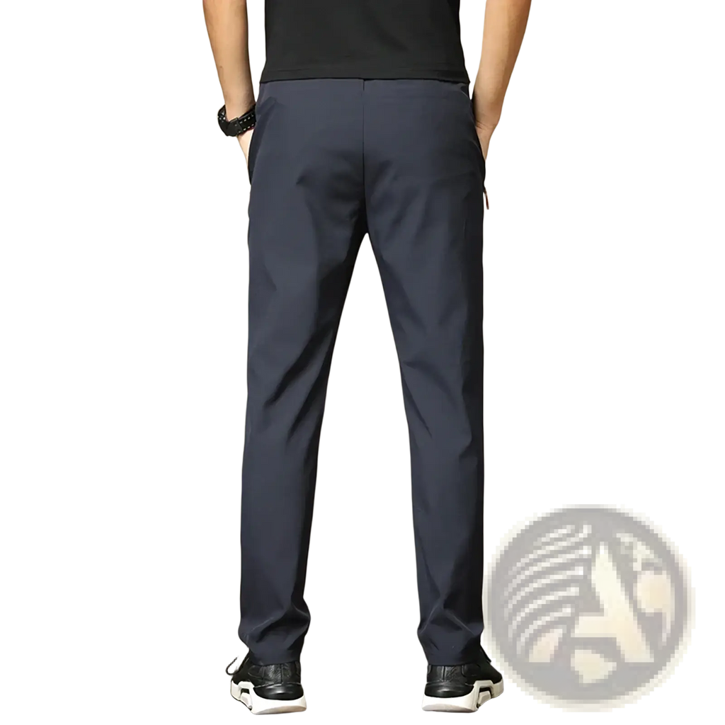 Dark navy blue slim fit men casual trousers made of smooth lightweight fabric with subtle side pockets and modern design