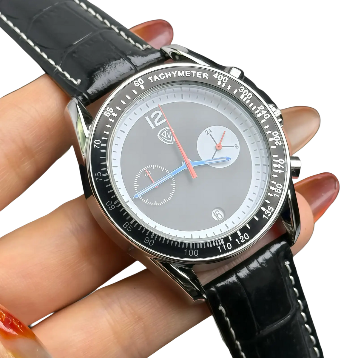 A men chronograph leather quartz watch with a silver-toned case gray dial and black crocodile leather strap with white stitching