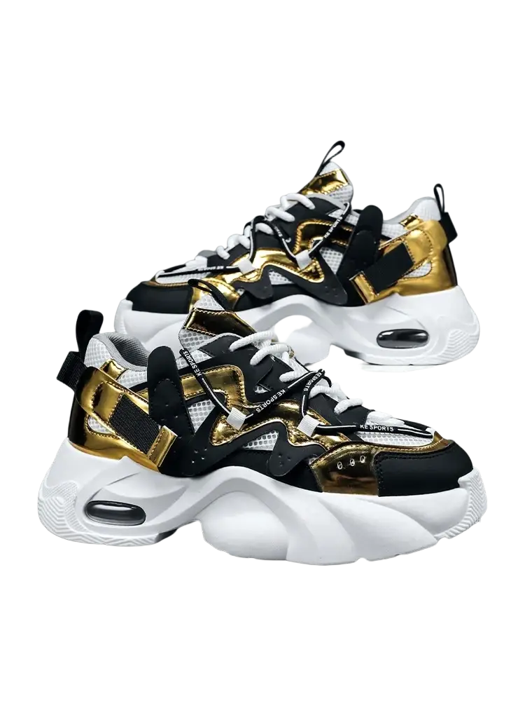 Men chunky air cushion casual sneakers in black and gold with white soles and visible air cushioning units