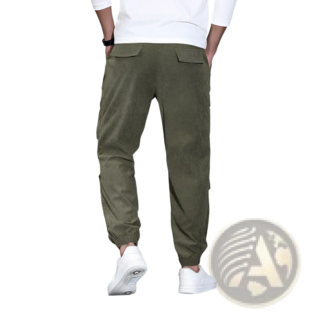 Men corduroy cargo pants in olive green with elastic cuffs and multiple side pockets for casual wear