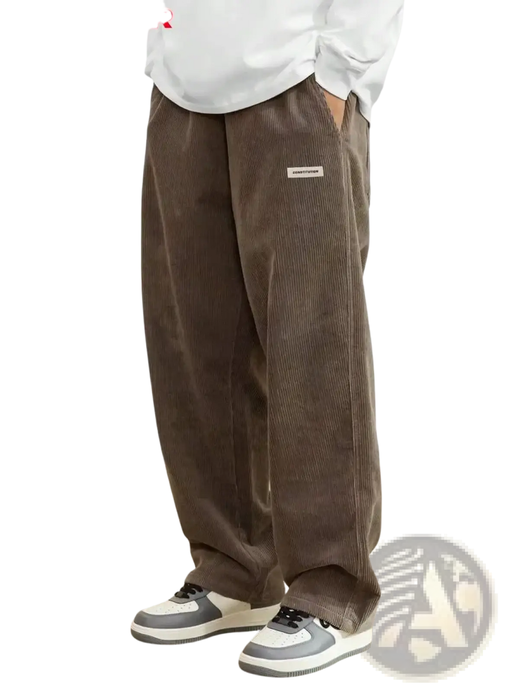Men corduroy loose casual pants in brown with a relaxed wide-leg cut and a small white label on the upper right leg