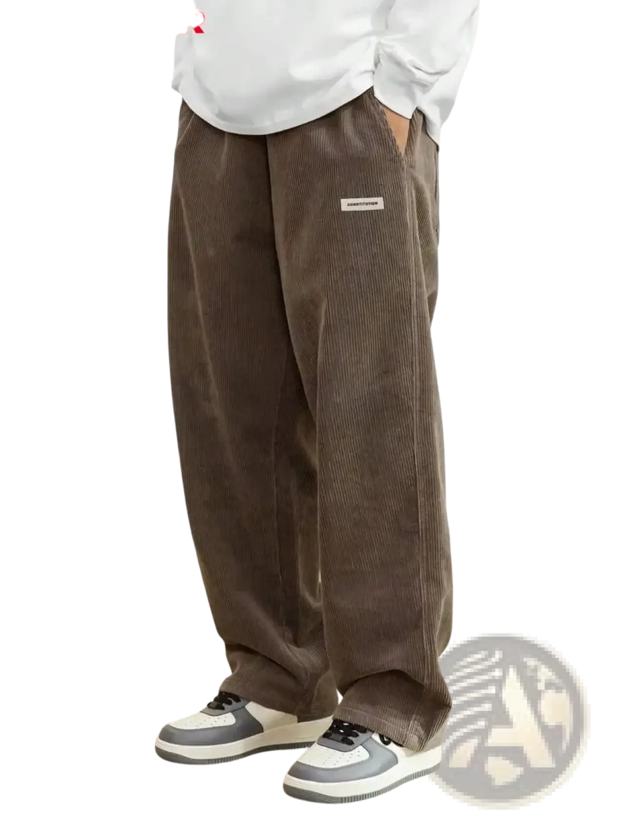 Men corduroy loose casual pants in brown with a relaxed wide-leg cut and a small white label on the upper right leg