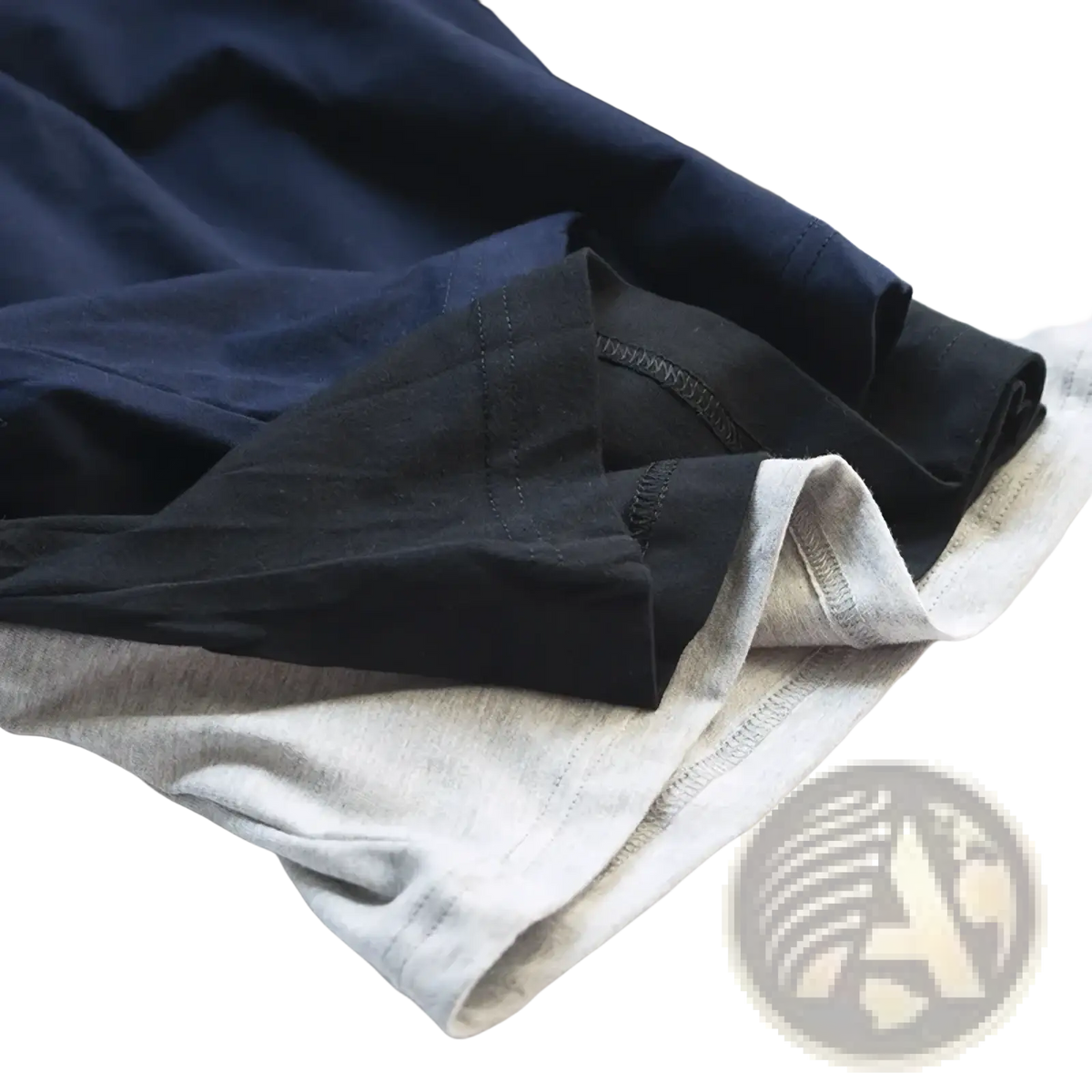 Stacked navy blue black and heather gray soft cotton t-shirts paired with men cotton boxer shorts for casual gym lounging