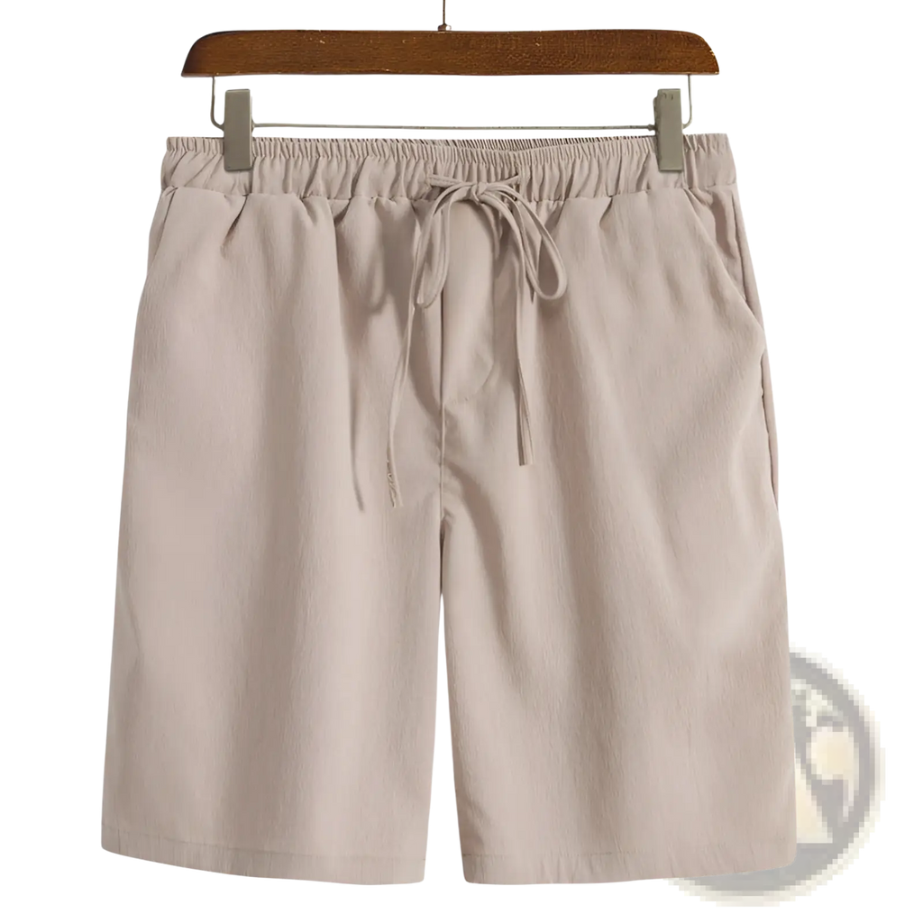 Beige men cotton linen beach shorts featuring an elastic waistband and matching drawstring for comfort