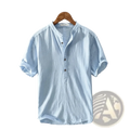 Men cotton linen casual shirt in light blue with short sleeves textured fabric and dark brown henley buttons