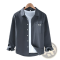 Dark gray men cotton long sleeve cargo shirt with chest pocket featuring a white xyrfl label minimalist casual top