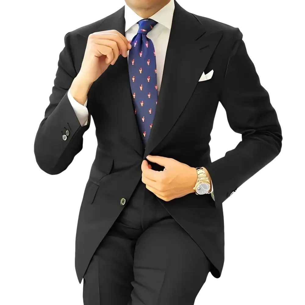 Men dark gray tailored suit tuxedo blazer jacket paired with a navy blue tie featuring a subtle pink flamingo pattern
