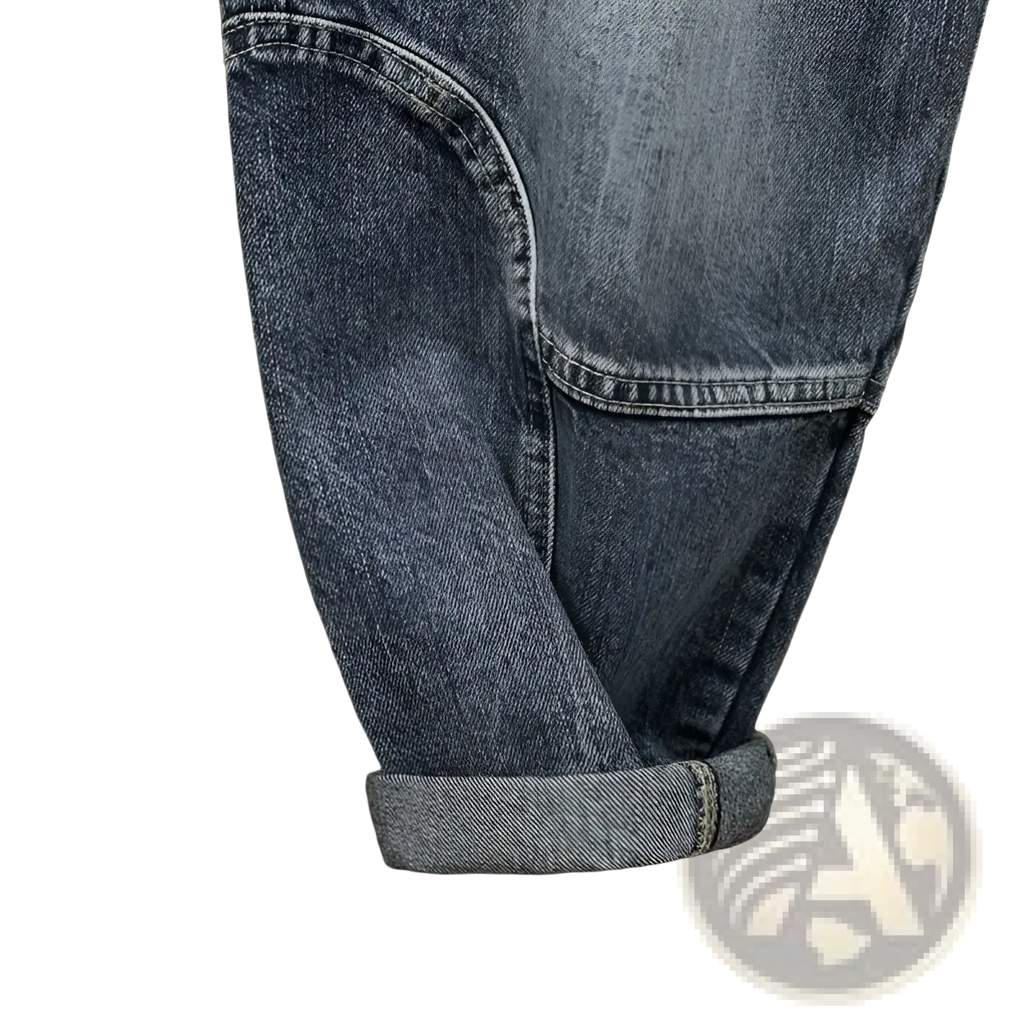 Men denim cargo jeans in dark wash with rolled cuffs and visible stitching details for casual loose wear