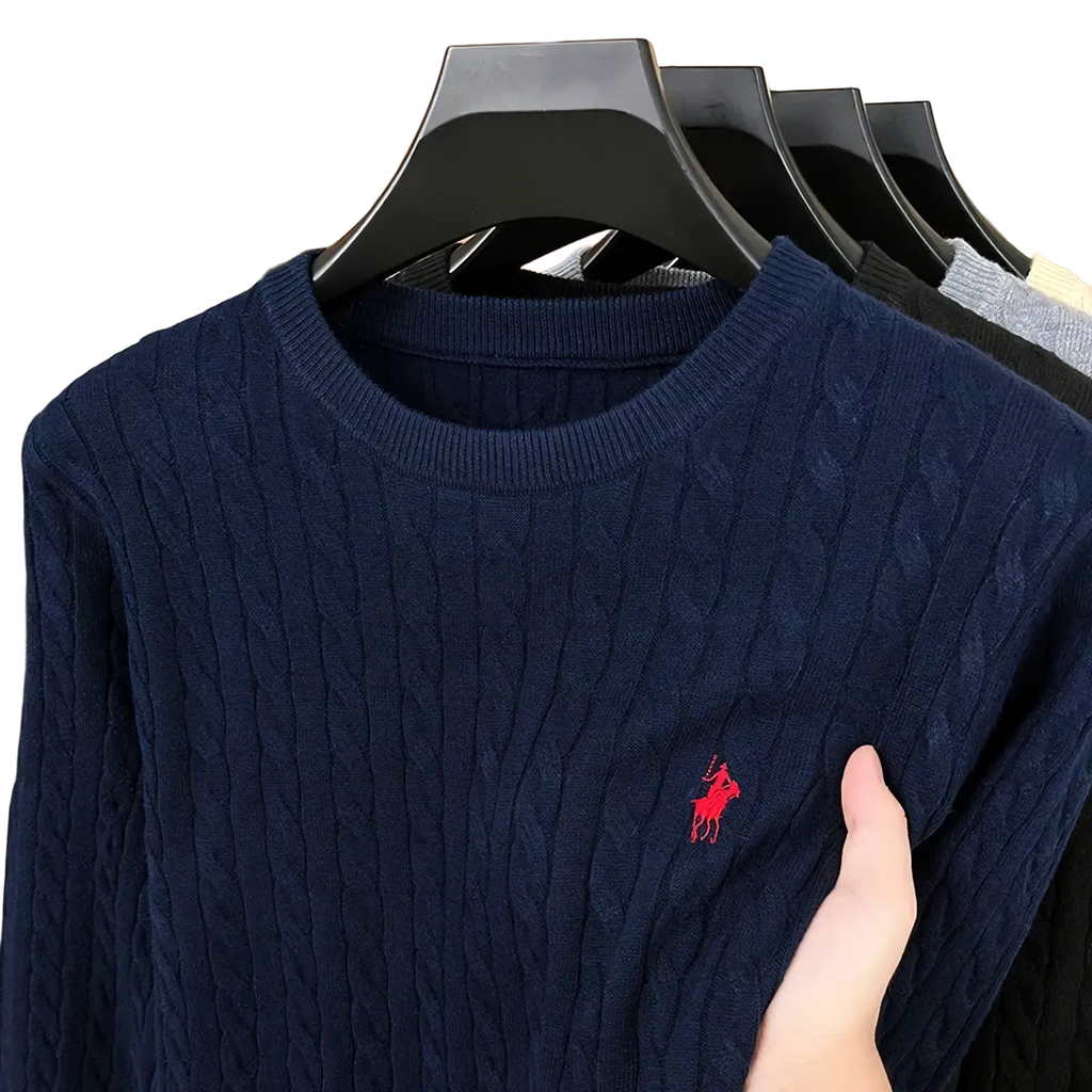 Navy blue men’s cable knit sweater with red embroidered polo player logo on the chest