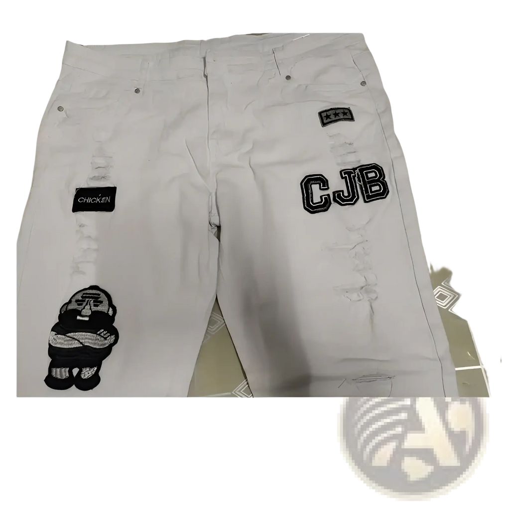 Men embroidered ripped skinny jeans in white denim featuring black cjb patches and a cartoon chicken design