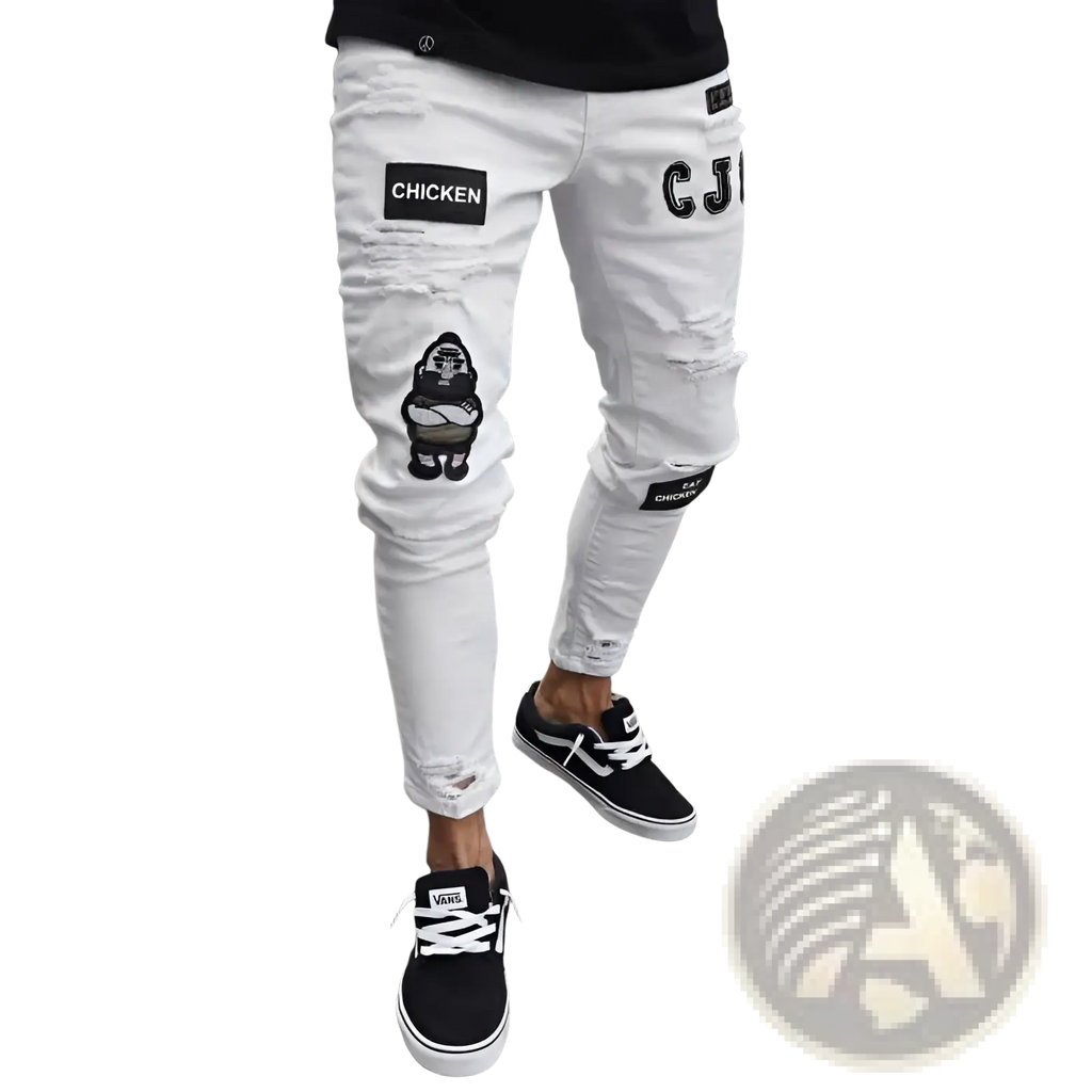 Men embroidered ripped skinny white denim jeans with black chicken text and cartoon patches paired with black Vans sneakers