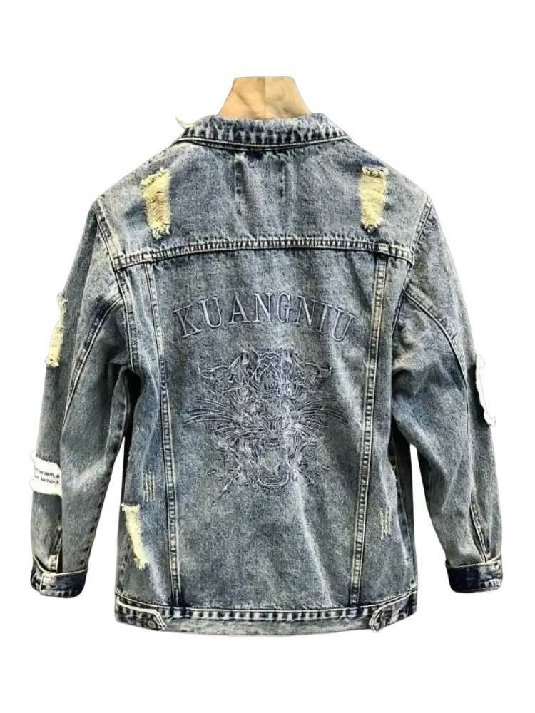 Back of a men embroidered tiger denim jacket with distressed faded blue fabric ripped patches and kuangnu dragon design