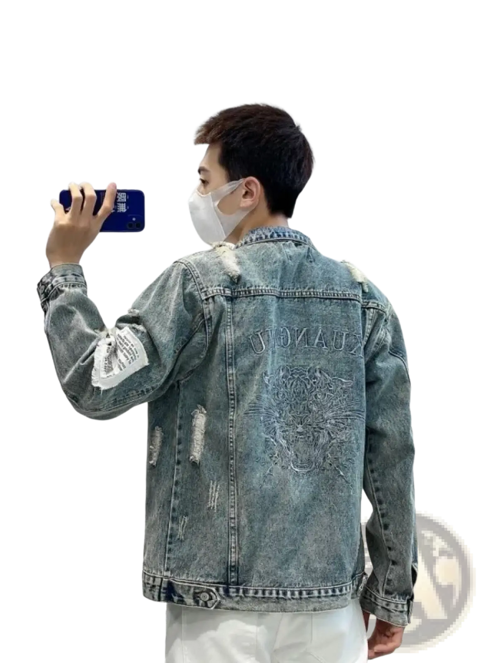 Back side of a men embroidered tiger denim jacket in light blue distressed denim with white patchwork sleeves