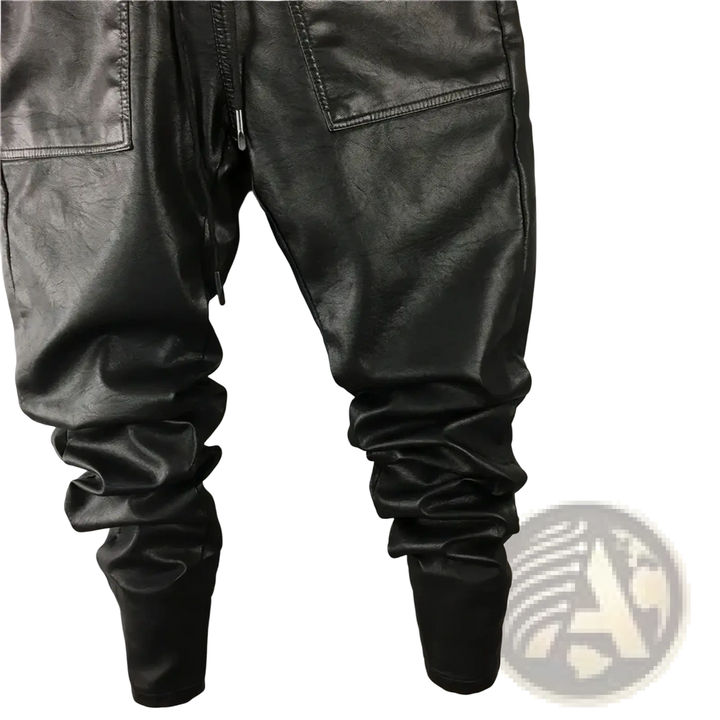 Men faux leather cargo joggers in black with slouchy tapered fit and visible stitching details
