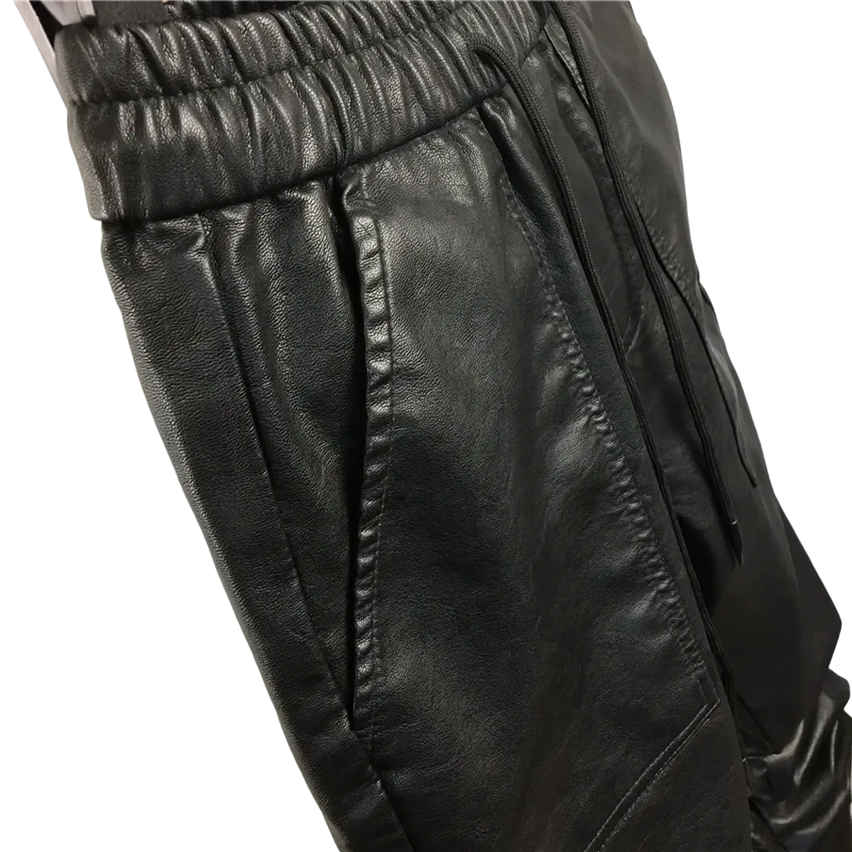 Men faux leather cargo joggers in black featuring an elastic waistband and side pockets for casual wear