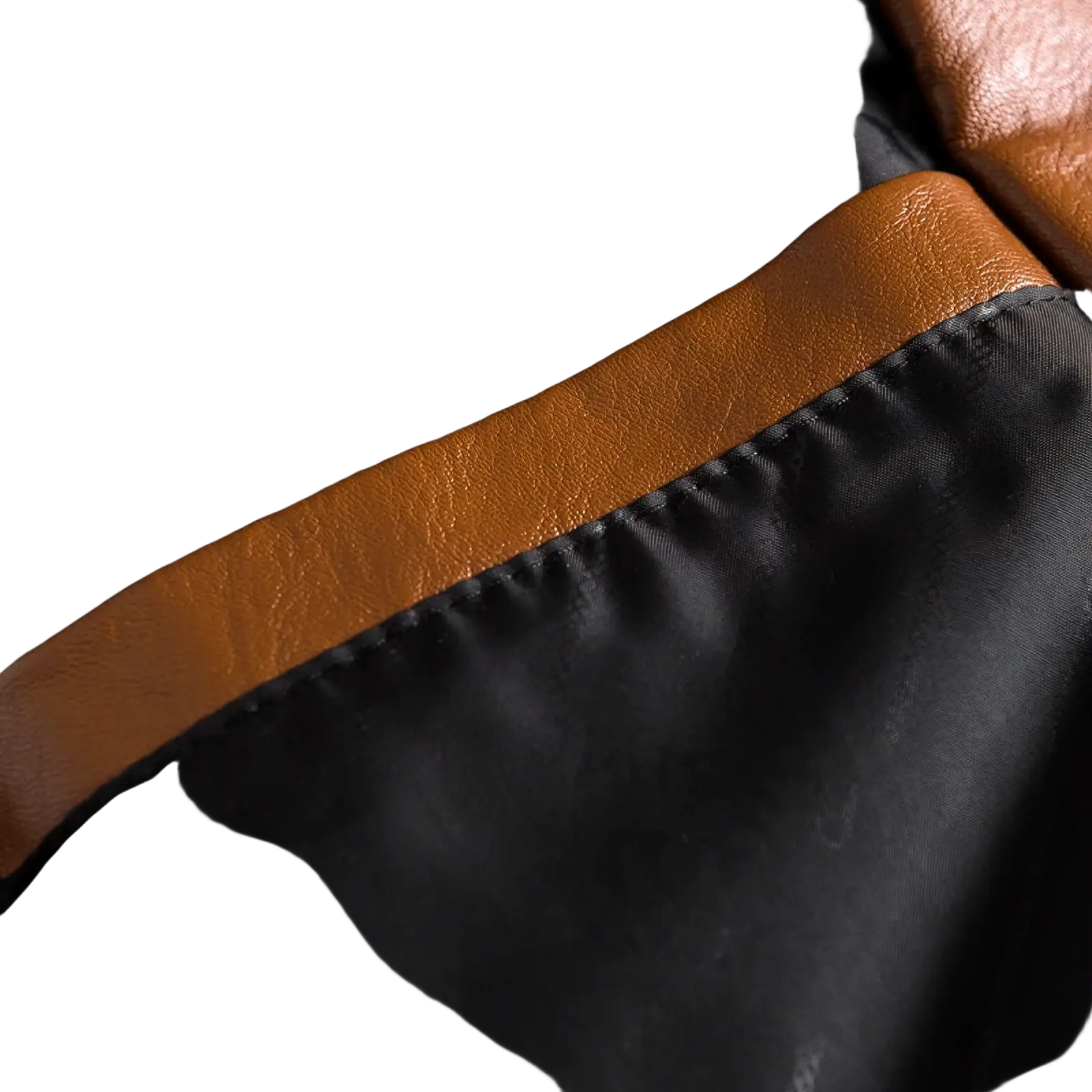 A men faux leather double-breasted blazer with tan leather trim accenting the black satin lining