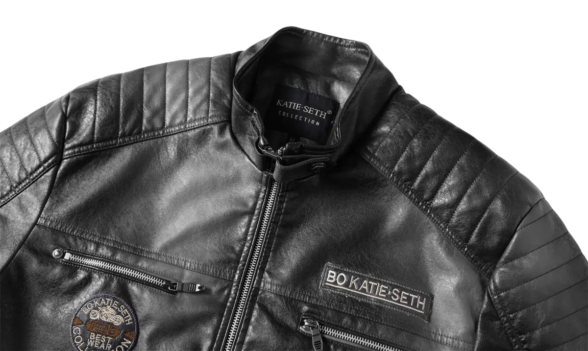 Men faux leather motorcycle winter bomber jacket in black with quilted shoulders and embroidered patches