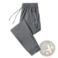 Men fitness jogger sweatpants 5xl in gray with drawstring waistband and vertical zipper pocket with innew sport branding
