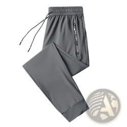 Men fitness jogger sweatpants 5xl in gray with drawstring waistband and vertical zipper pocket with innew sport branding