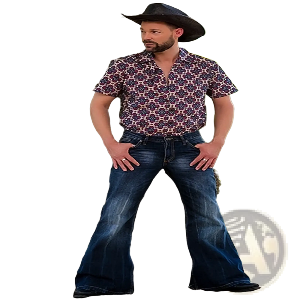 Man wearing black cowboy hat and patterned purple floral shirt with classic blue denim flared jeans vintage embroidered pants