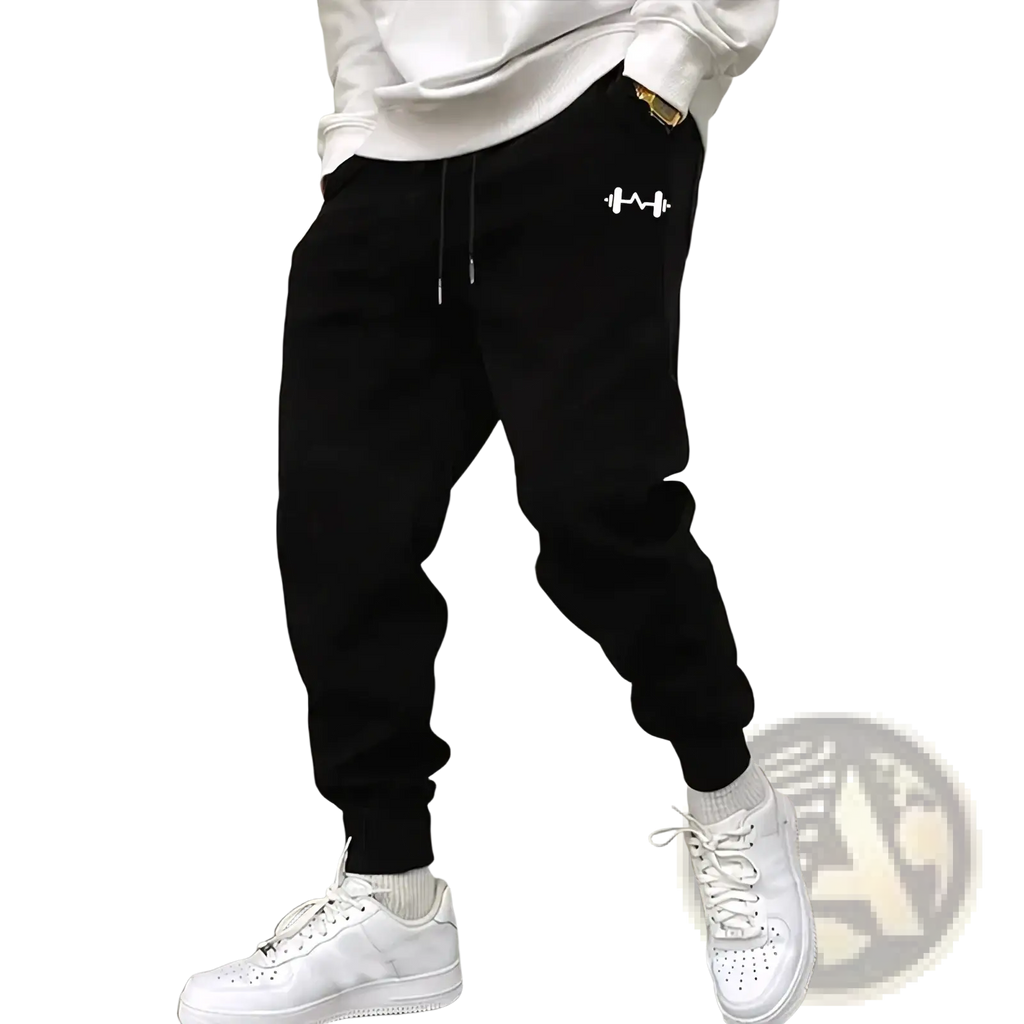 Men fleece lined black joggers with white barbell graphic on left thigh and matching drawstring waistband for winter streetwear