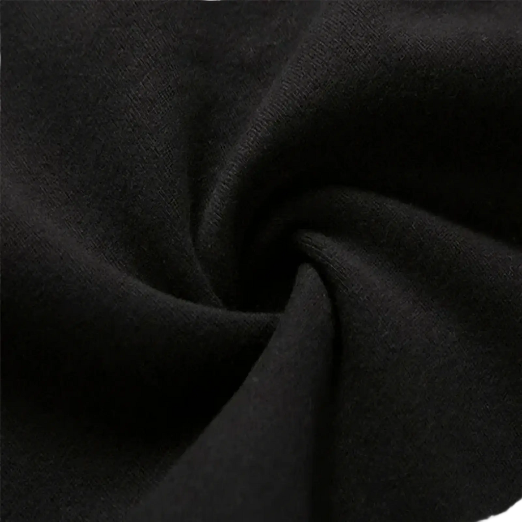 Men fleece lined joggers in soft black knit fabric with subtle texture and gentle folds for winter streetwear sweatpants