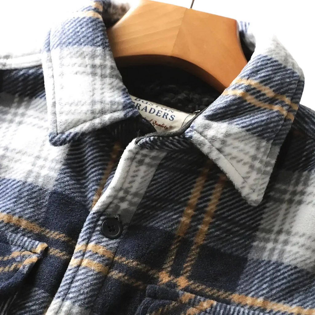 Men fleece lined plaid shirt jacket in navy gray and tan with soft fleece lined collar and cozy flannel material