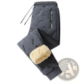 Men fleece lined thermal sweatpants in dark gray with plush beige fleece lining and drawstring waistband for winter use