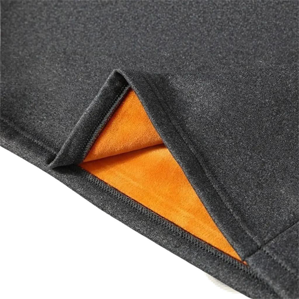 Men fleece lined thermal vest featuring dark gray fleece-lined pants with vibrant orange interior lining for warmth