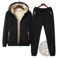 Men fleece lined tracksuit set with black fleece lined hooded sweatshirt and matching joggers featuring orange branding
