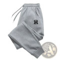 Men fleece Yankees jogger sweatpants in gray heathered fabric with black embroidered Yankees logo on left thigh