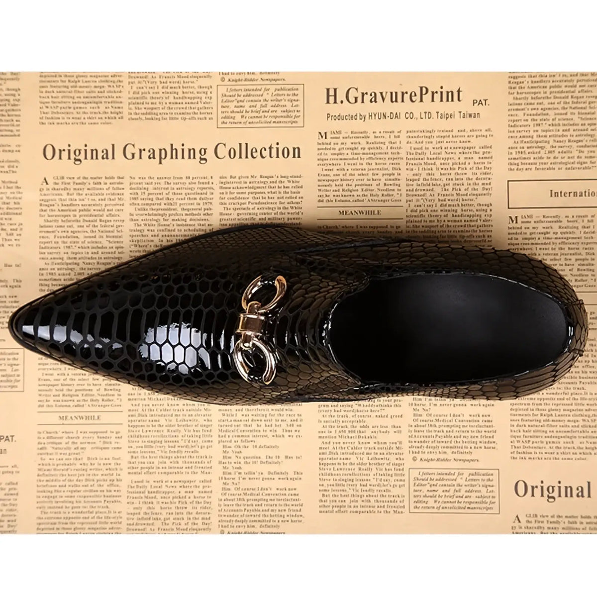 Black crocodile-patterned leather handbag with silver-toned clasp and chain strap complementing men genuine leather dress shoes