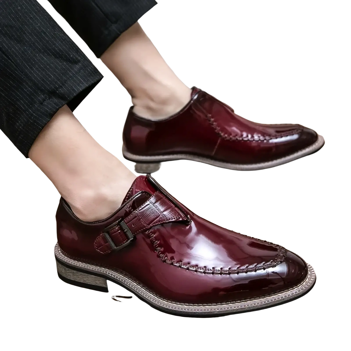 Men glossy patent leather dress shoes in polished burgundy with crocodile-embossed strap and stitched detailing
