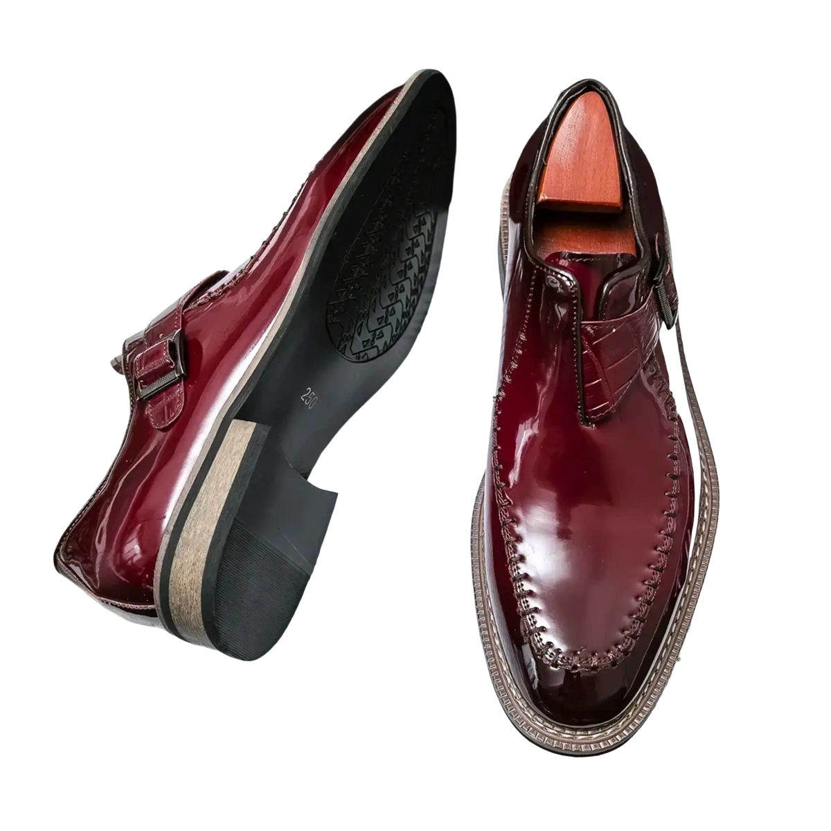 Men glossy patent leather dress shoes in polished burgundy slip-on style with sleek finish and decorative toe stitching