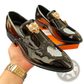 Men gold lion brogue loafers in black patent leather with gold-tone lion head wingtip embellishments