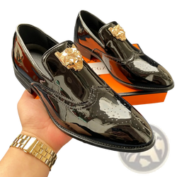 Men gold lion brogue loafers in black patent leather with gold-tone lion head wingtip embellishments