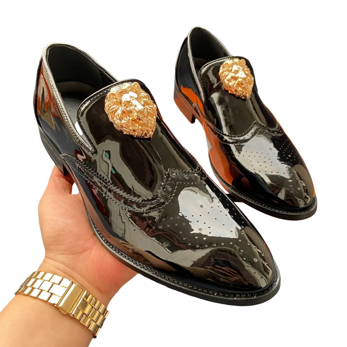 Black patent leather men gold lion brogue loafers featuring gold lion head embellishments and brogue detailing