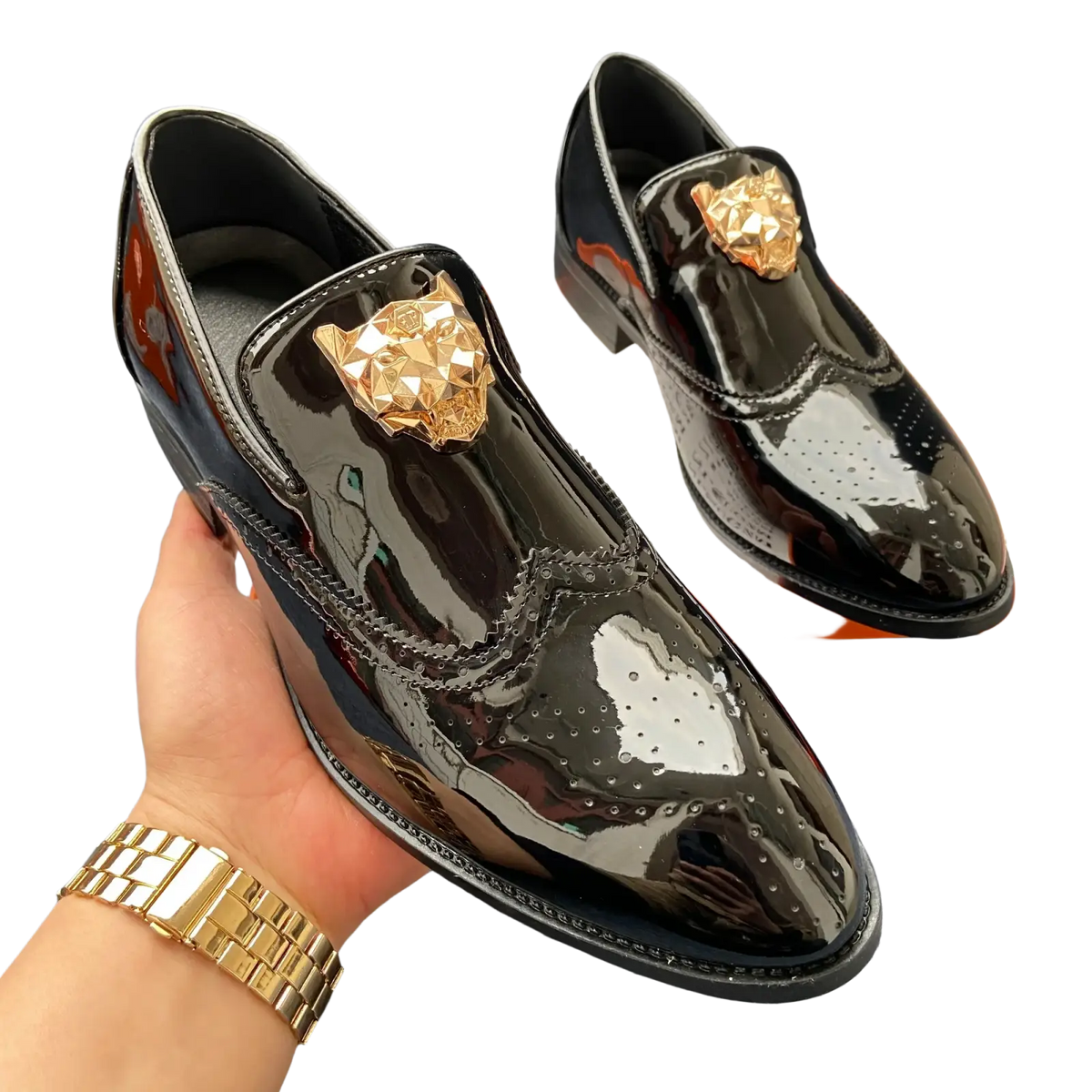 Black patent leather men gold lion brogue loafers with gold-tone lion head embellishments and brogue detailing