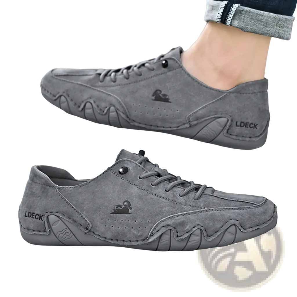 Men gray suede casual sneakers with wavy rubber sole and subtle duck logo for everyday wear