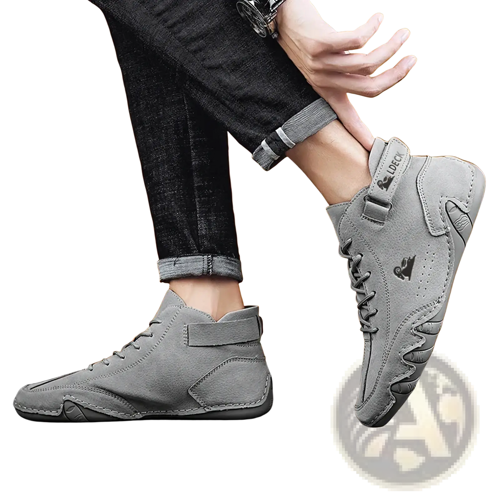 Men high top leather casual sneakers in gray with suede texture, stitched detailing, laces, and side adjustable strap