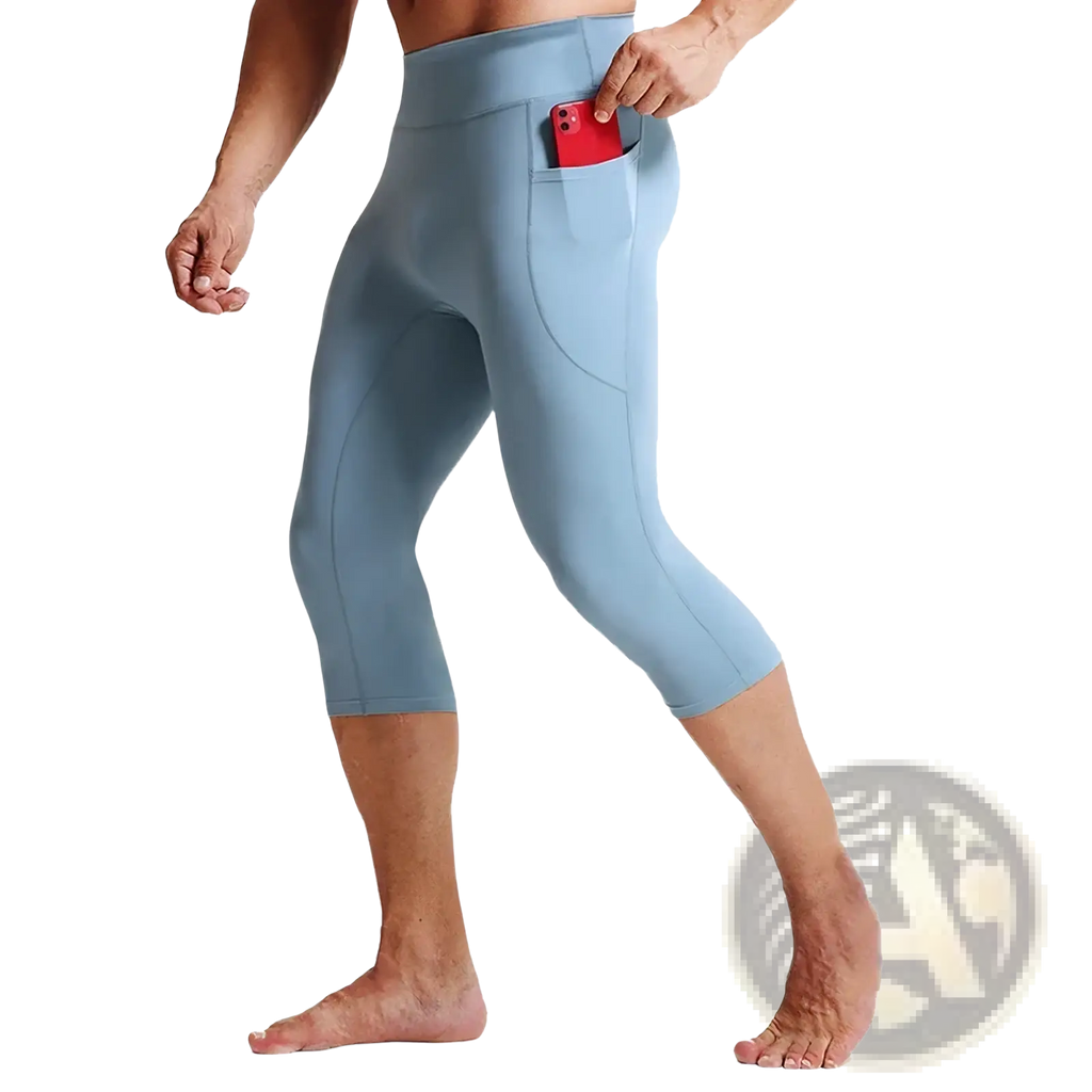 Men high waist compression light blue capri leggings with side pocket holding a red phone for active wear