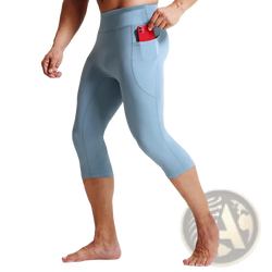 Men high waist compression light blue capri leggings with side pocket holding a red phone for active wear