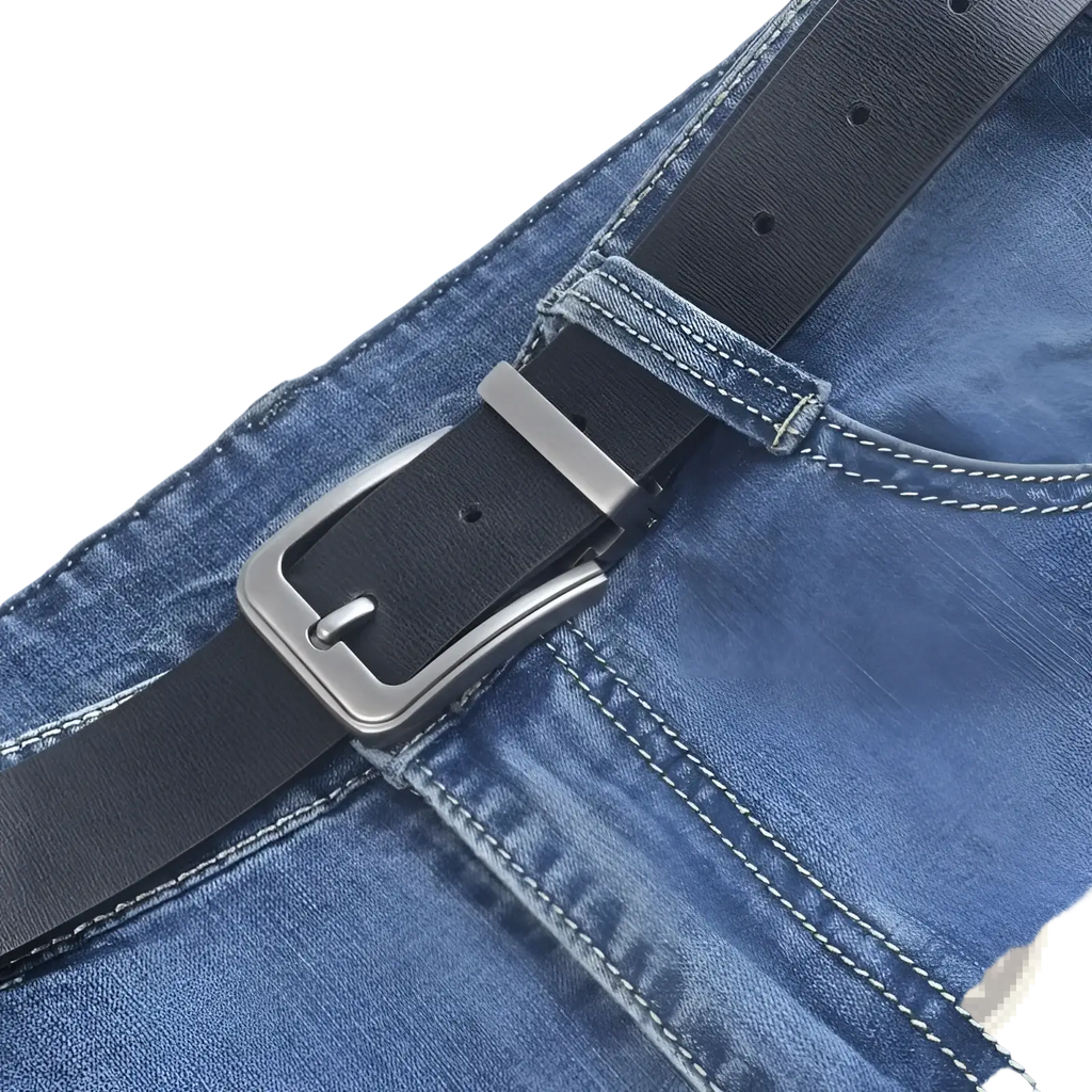 Men leather belt classic pin buckle black leather with silver-toned buckle fastened around blue denim jeans