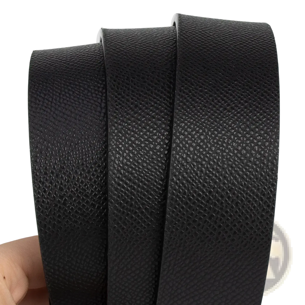 Black textured leather men business belt strap with pebbled grain finish and h buckle visible in the image