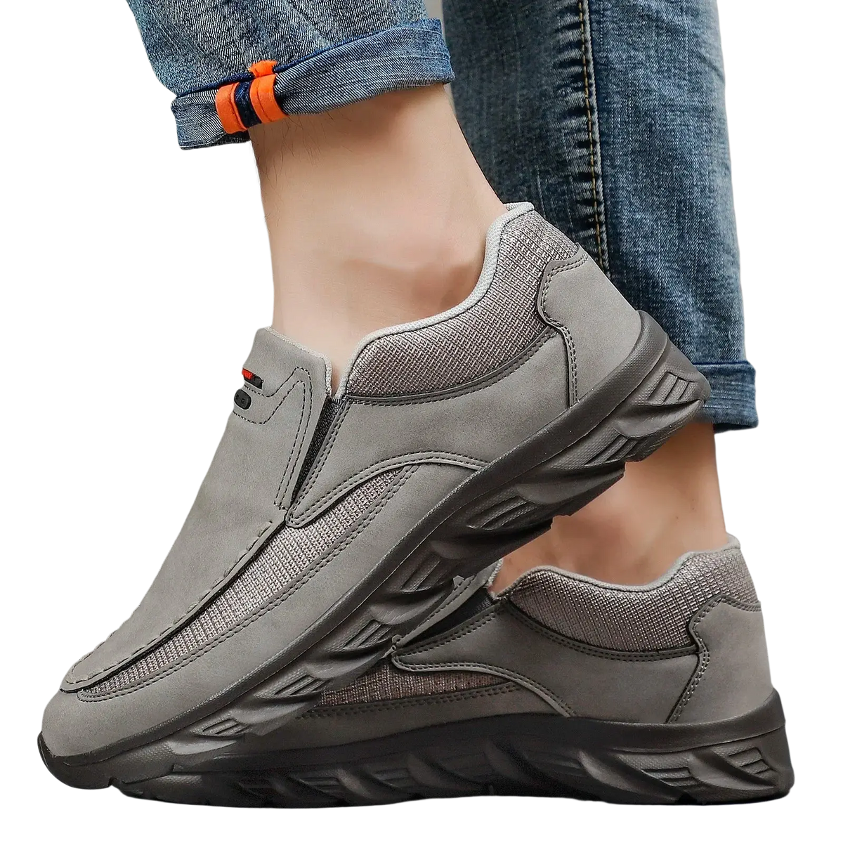 Men leather casual slip-on shoes in gray with textured upper black rubber sole and orange accent on the cuff